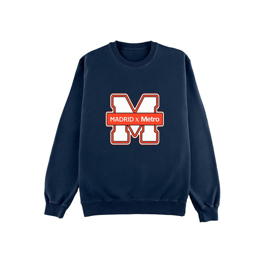 Sudadera azul marino con logo grande M y texto MADRID x Metro en el centro