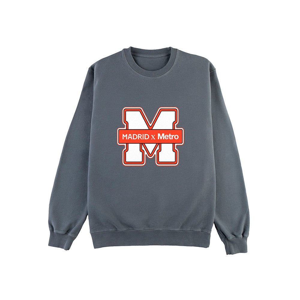 Sudadera gris con logo M y texto MADRID x Metro en el centro