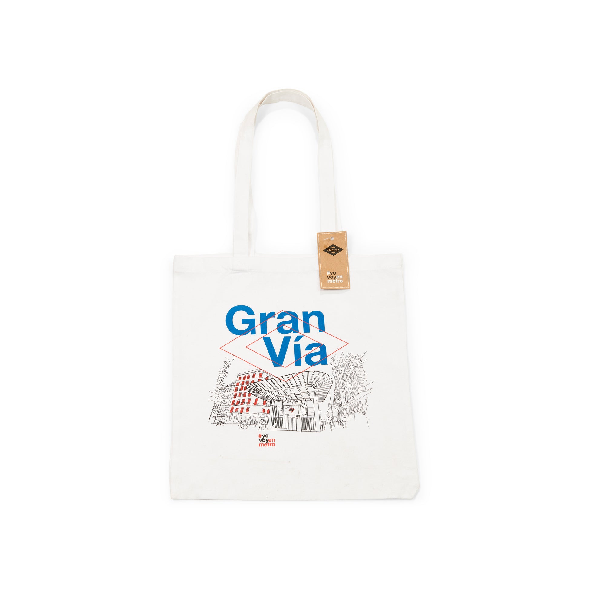 Bolsa de tela blanca con diseño Gran Vía Madrid y dibujo de estación de metro.