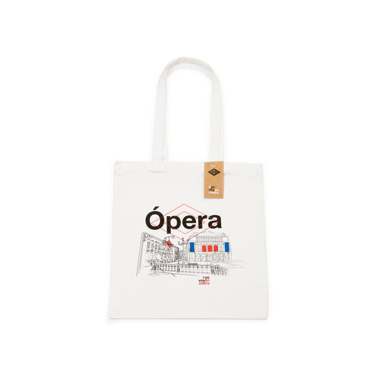 Bolsa de tela blanca con ilustración de la estación Ópera del metro de Madrid y edificios icónicos.