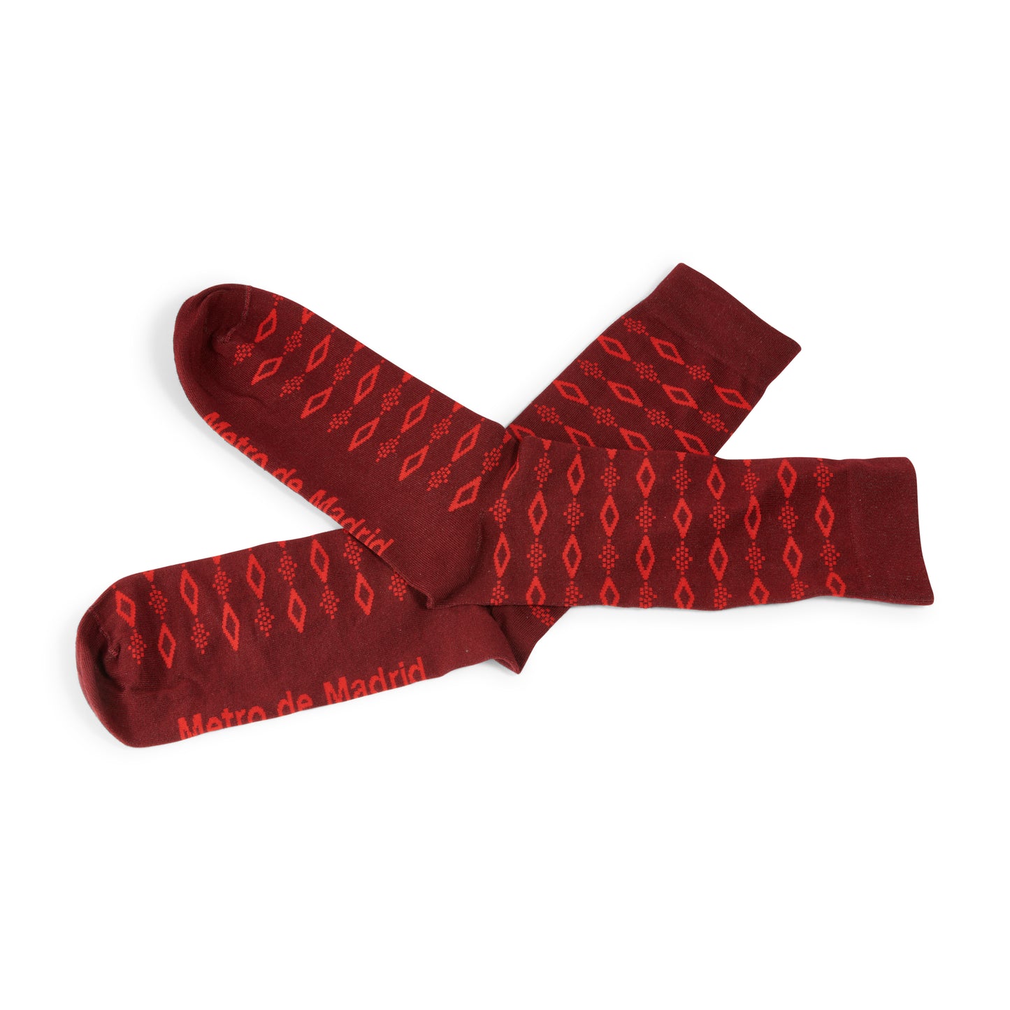 calcetines rojos Metro de Madrid con patrón geométrico diamante en fondo blanco