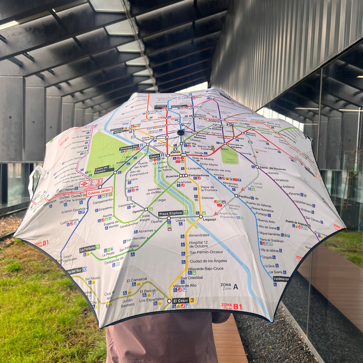 Paraguas plegable plano obras Metro