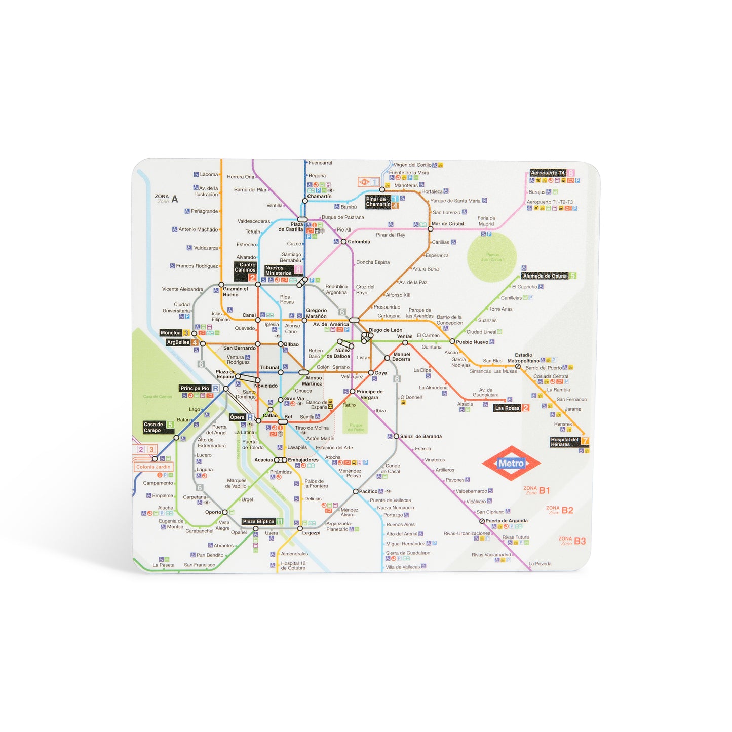 Mapa del metro de Madrid impreso en tabla blanca, líneas y estaciones visibles.