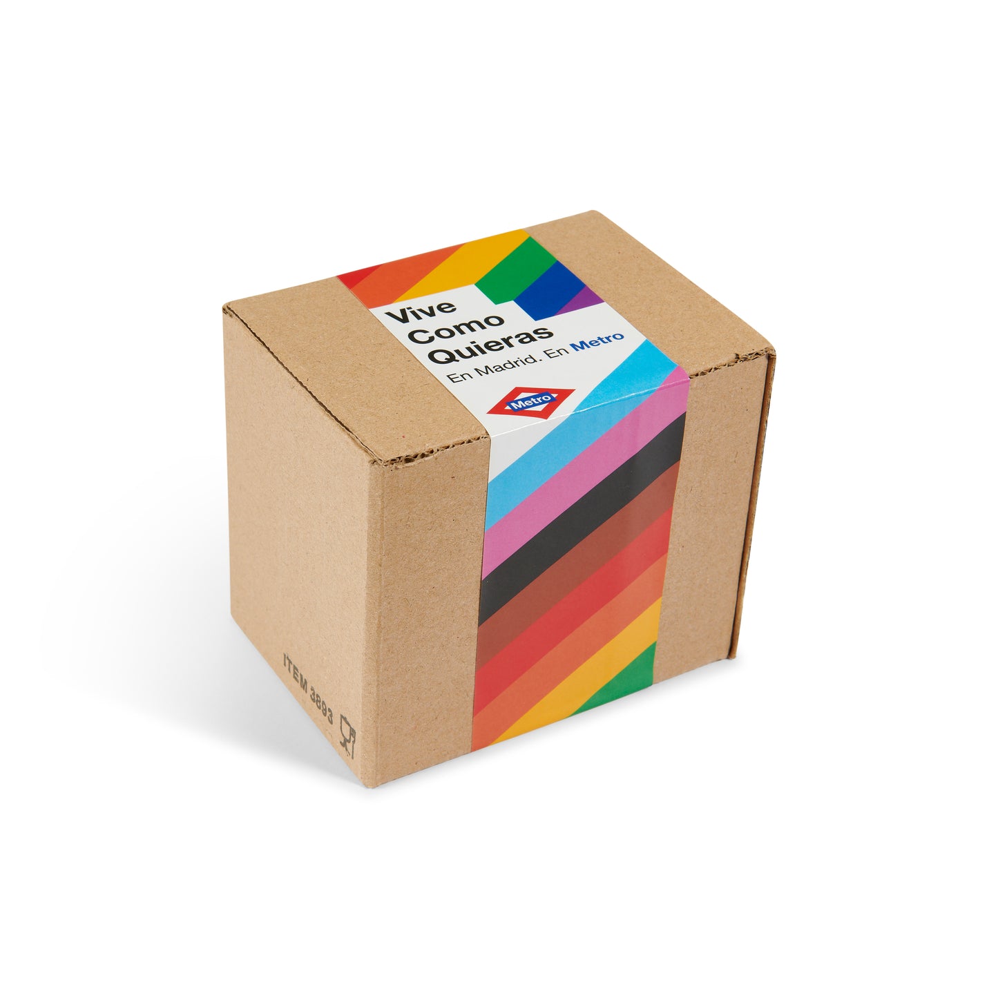 Caja de cartón con cinta arcoíris y logo Metro Madrid, leyenda Vive Como Quieras