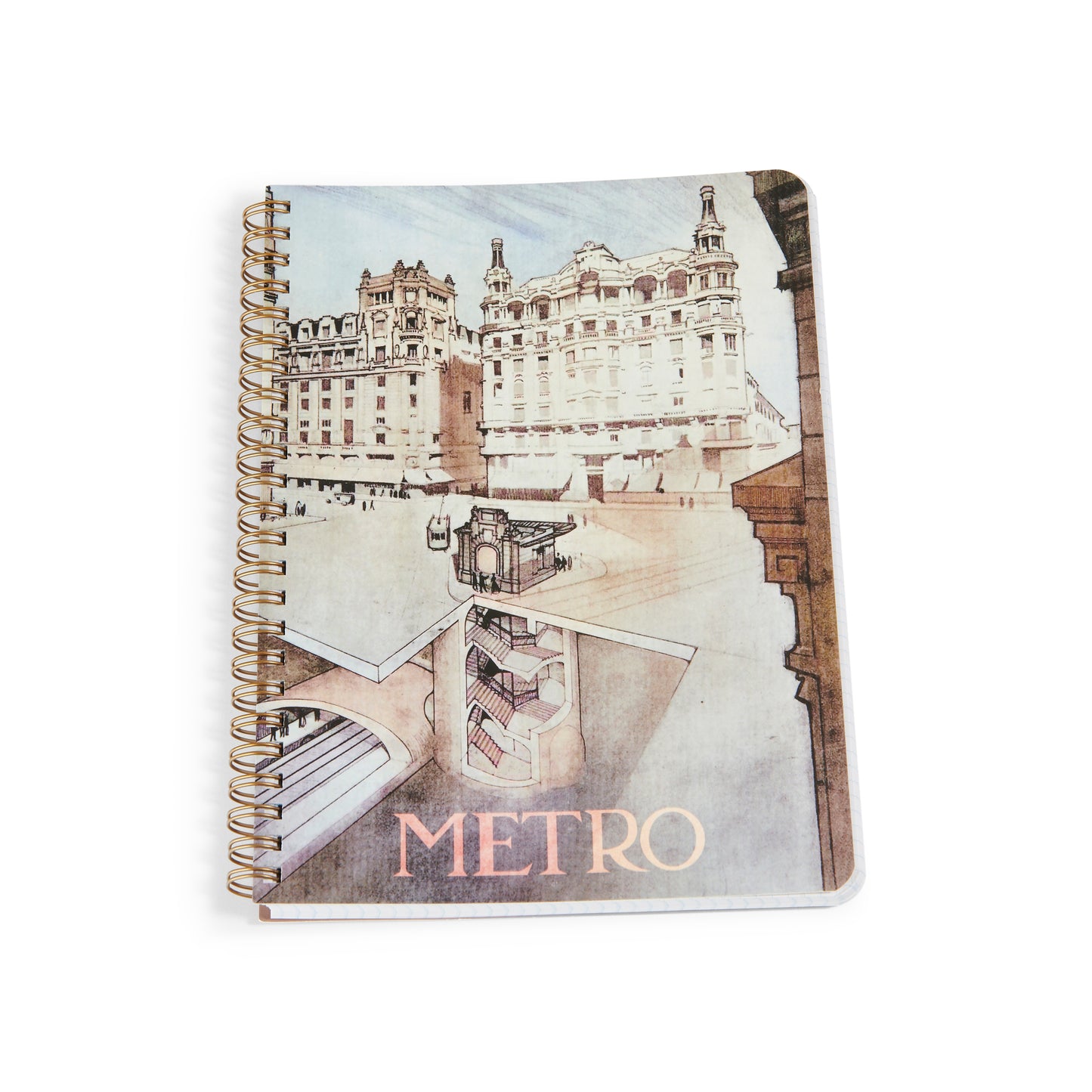 Cuaderno espiral con ilustración arquitectónica de edificio clásico y metro, portada 'METRO'.
