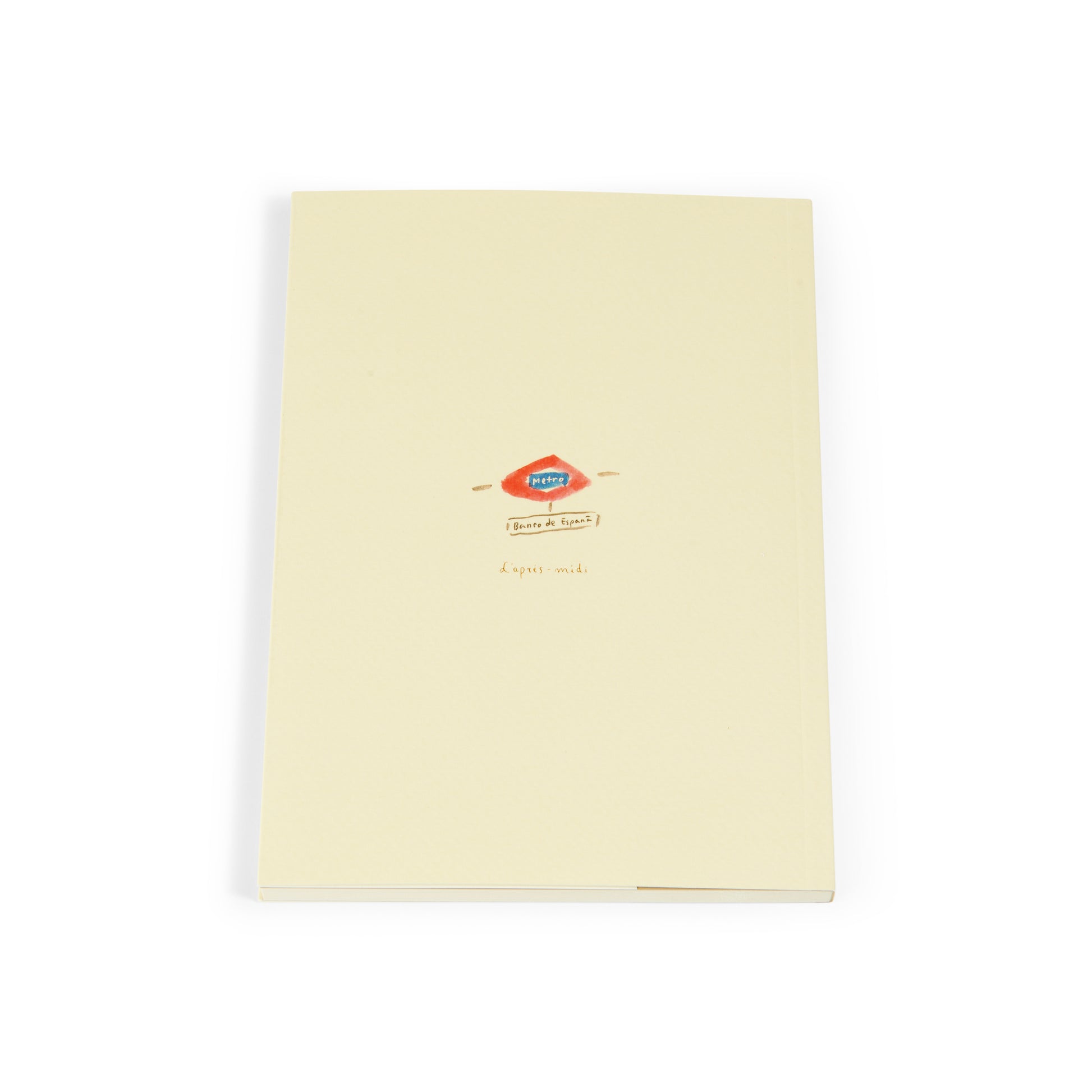 Cuaderno beige minimalista Metro, portada simple con logo y texto pequeño en fondo blanco.